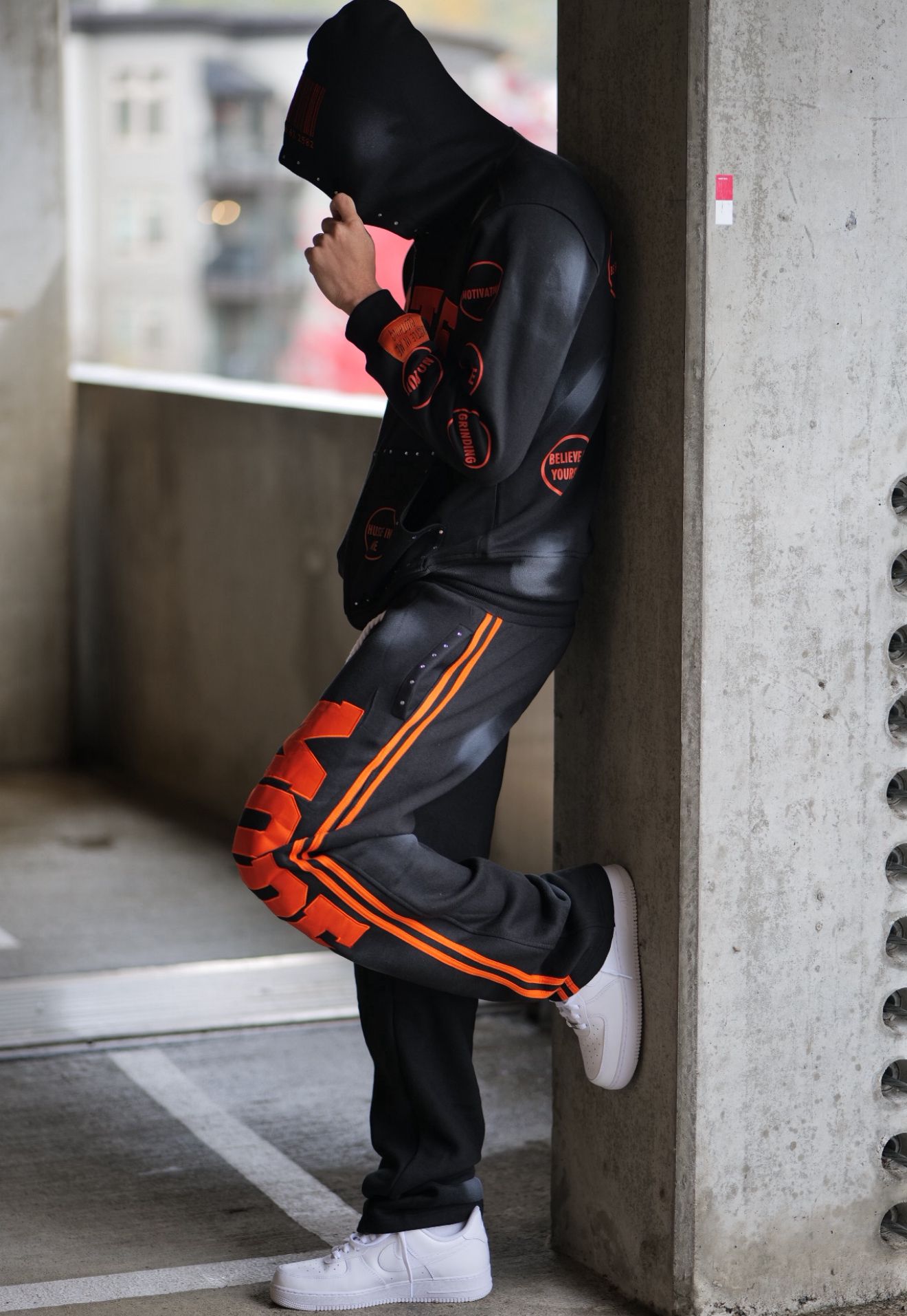 Hustle “Mode” Black & Orange Studded Tracksuit